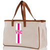 a canvas tote bag with a pink and white stripe