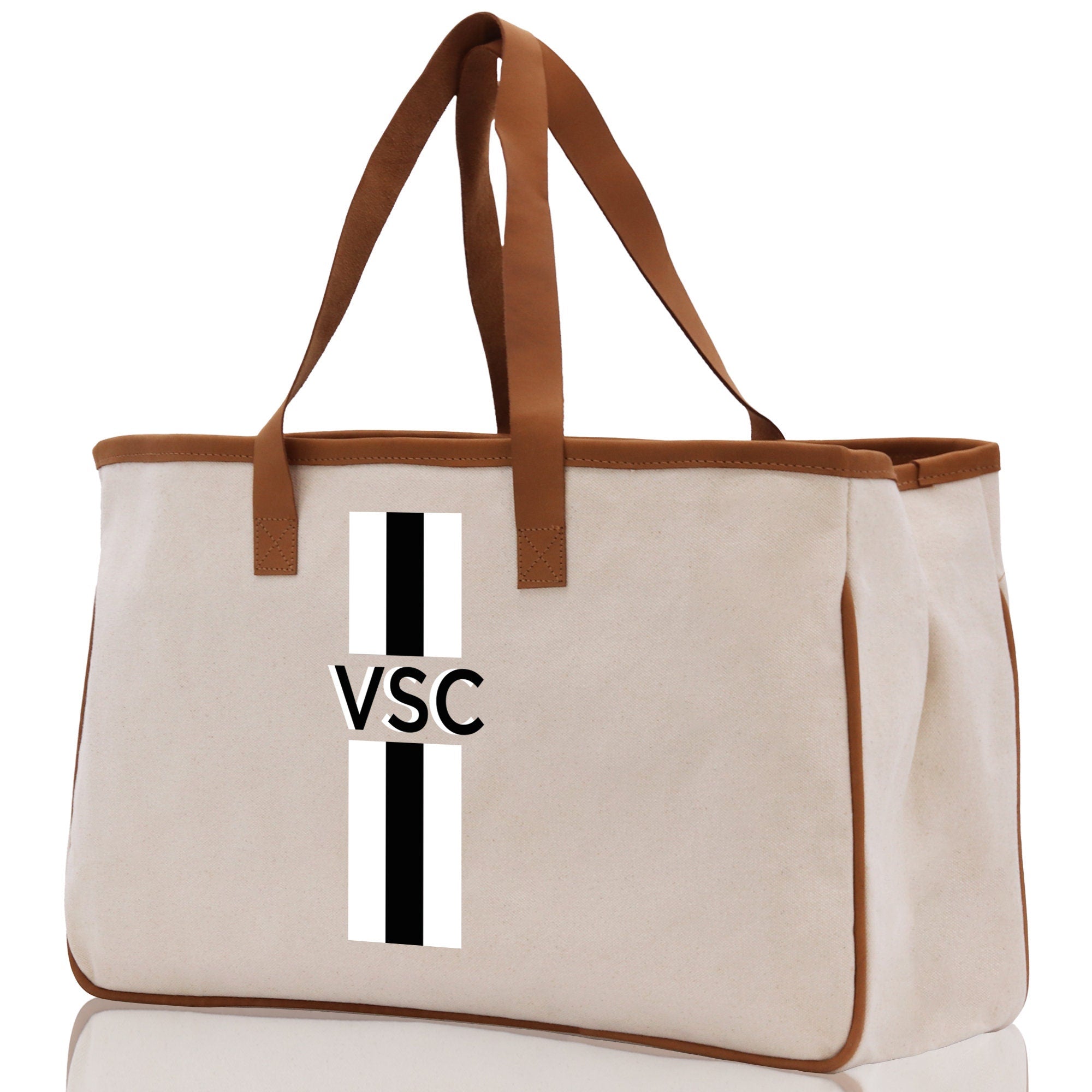a canvas tote bag with a cross on it