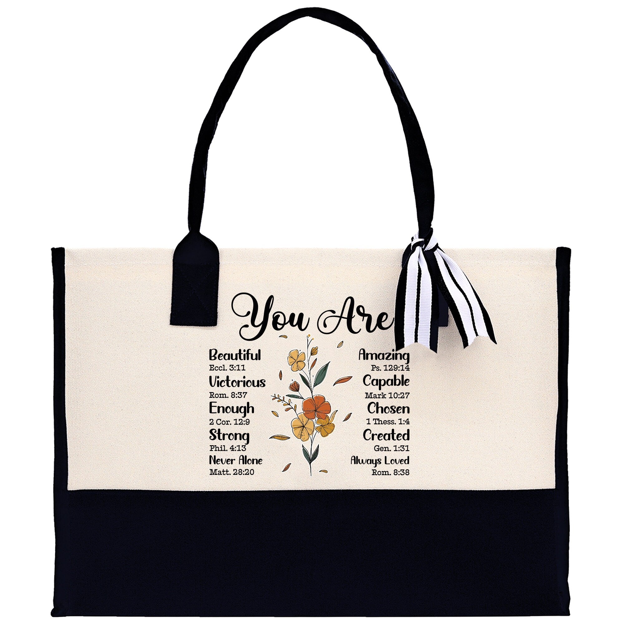 a black and white tote bag with the words you are surrounded by flowers