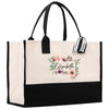 a black and white tote bag with flowers on it