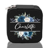 a black case with blue flowers and the word charlotte on it