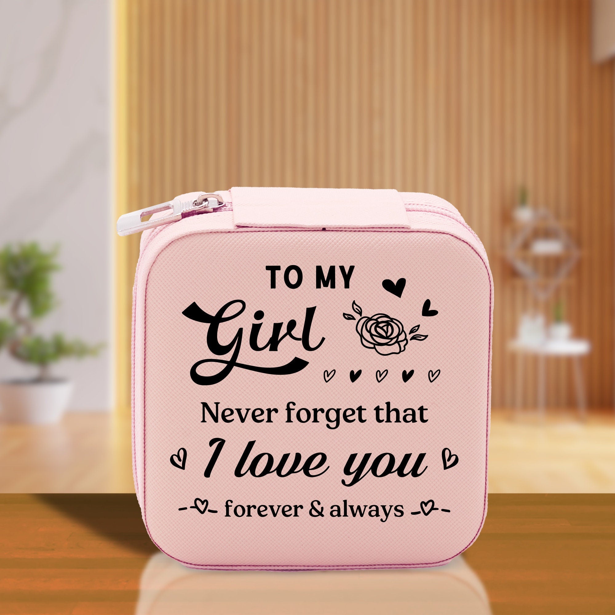 a pink lunch box with the words to my girl never forget that i love you