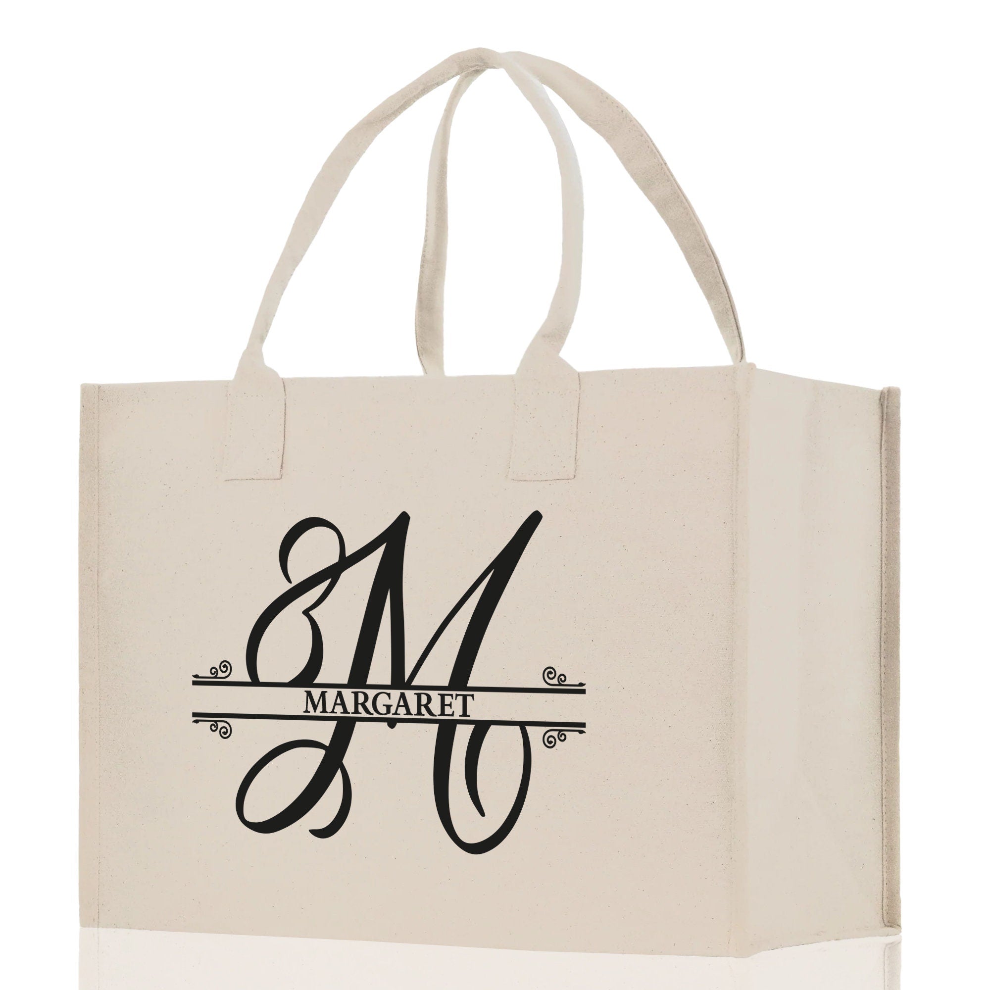a white shopping bag with the letter m on it