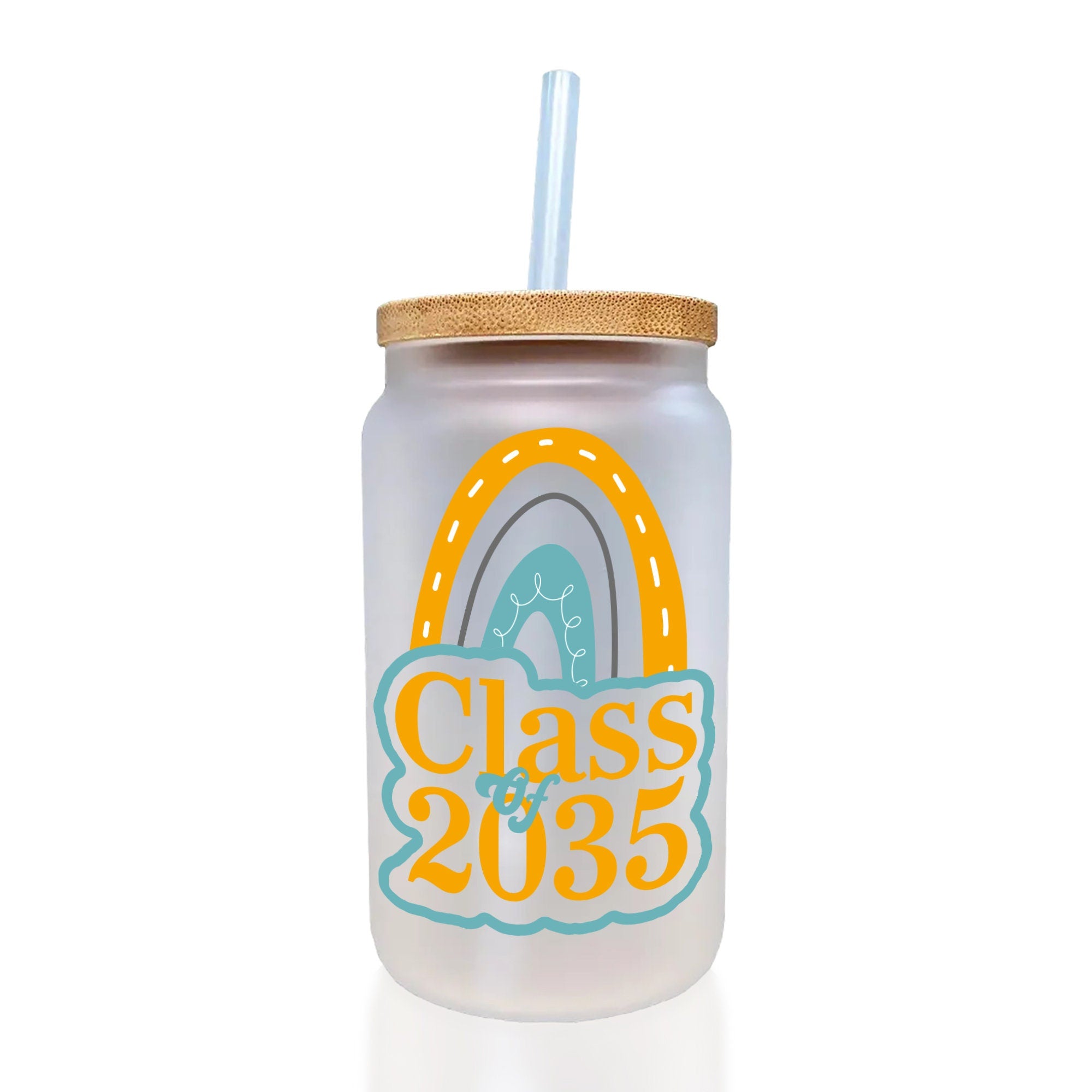 a glass cup with a straw in it