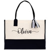 a black and white bag with a name on it