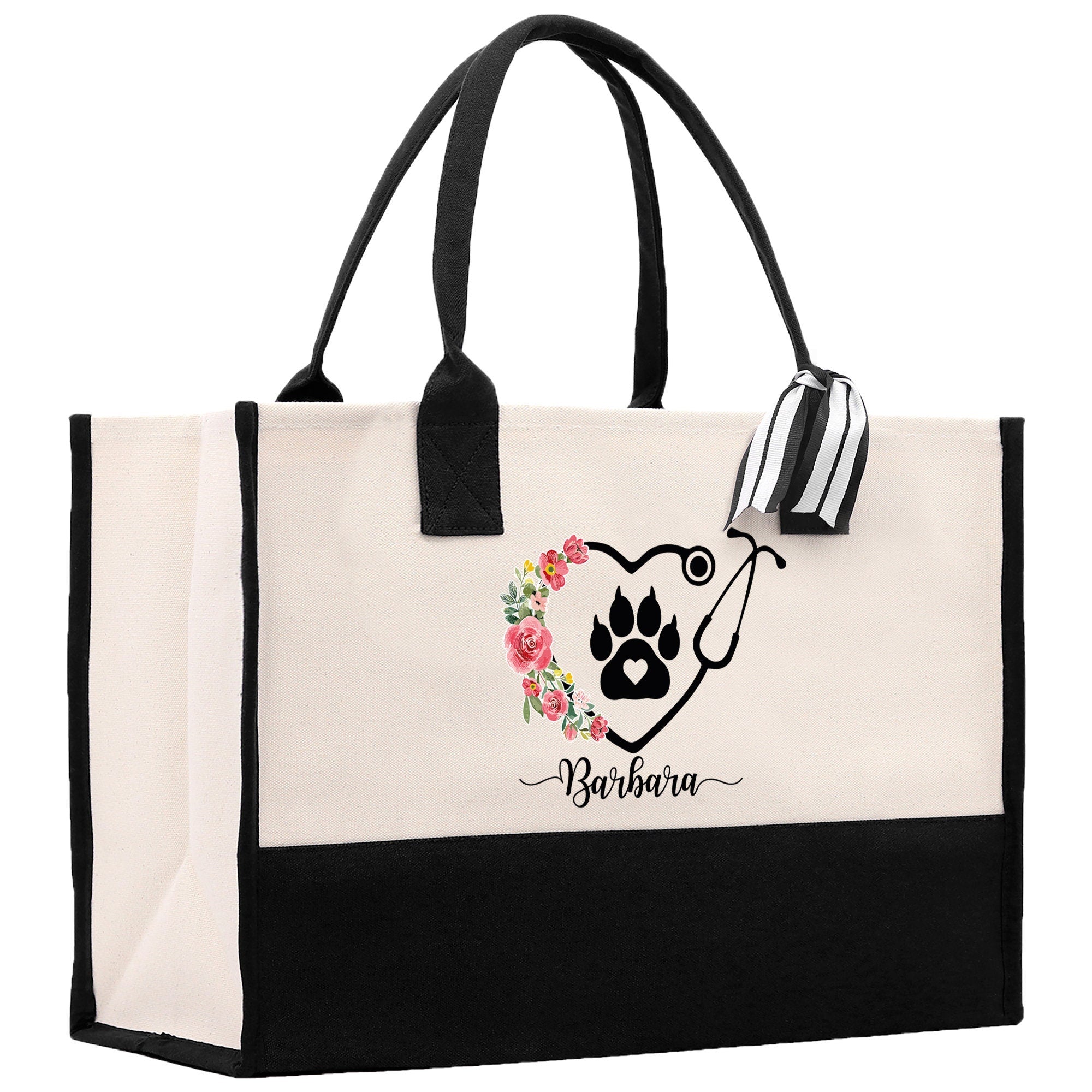 a black and white bag with a dog paw on it