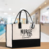 a black and white bag with a nurse on it