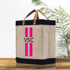 a canvas bag with a pink stripe on it