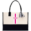 a black and white bag with a pink and white stripe