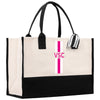 a white and black bag with a pink cross on it