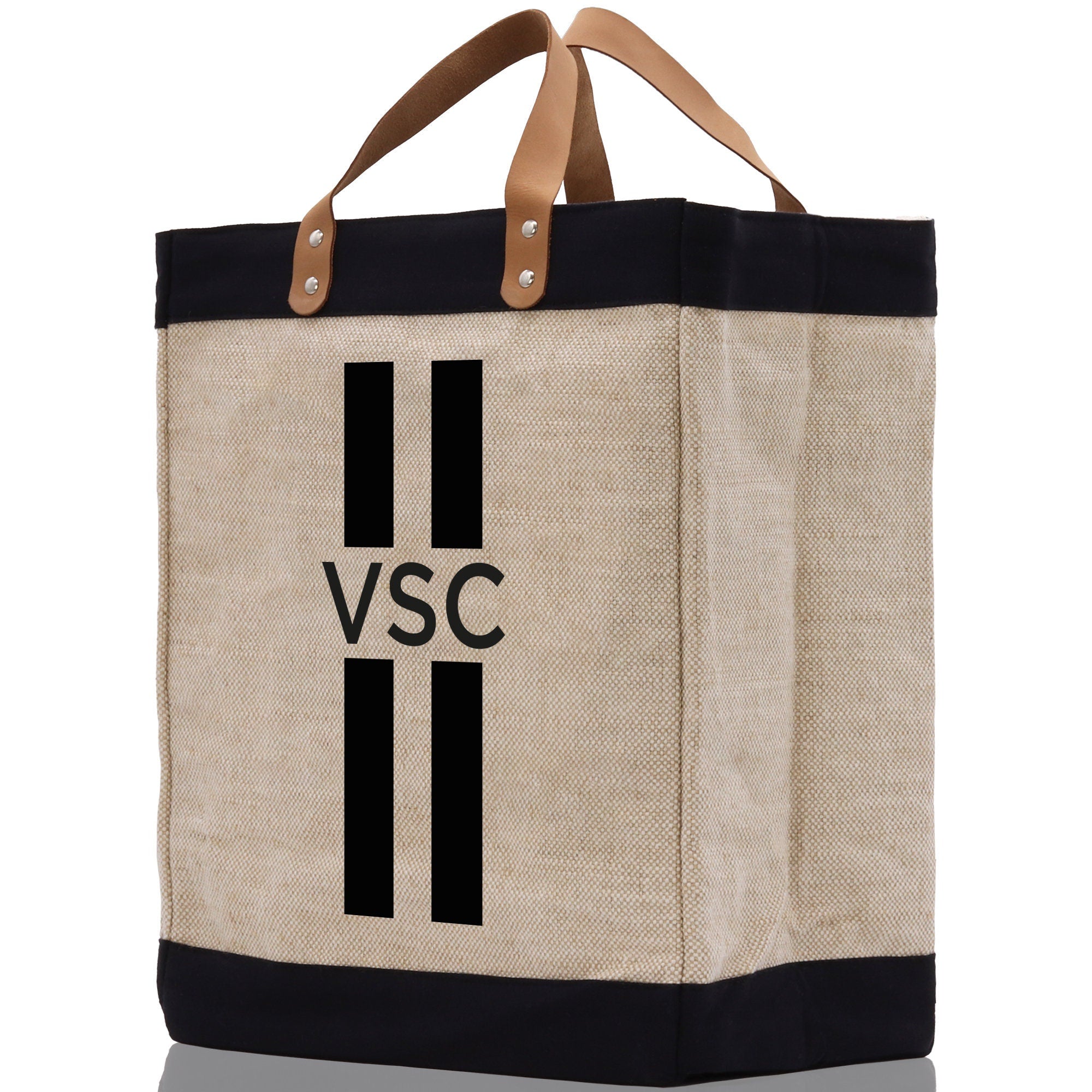 a canvas tote bag with a black and white stripe