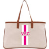 a canvas bag with a pink and white stripe
