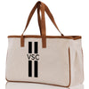 a canvas tote bag with black and white stripes