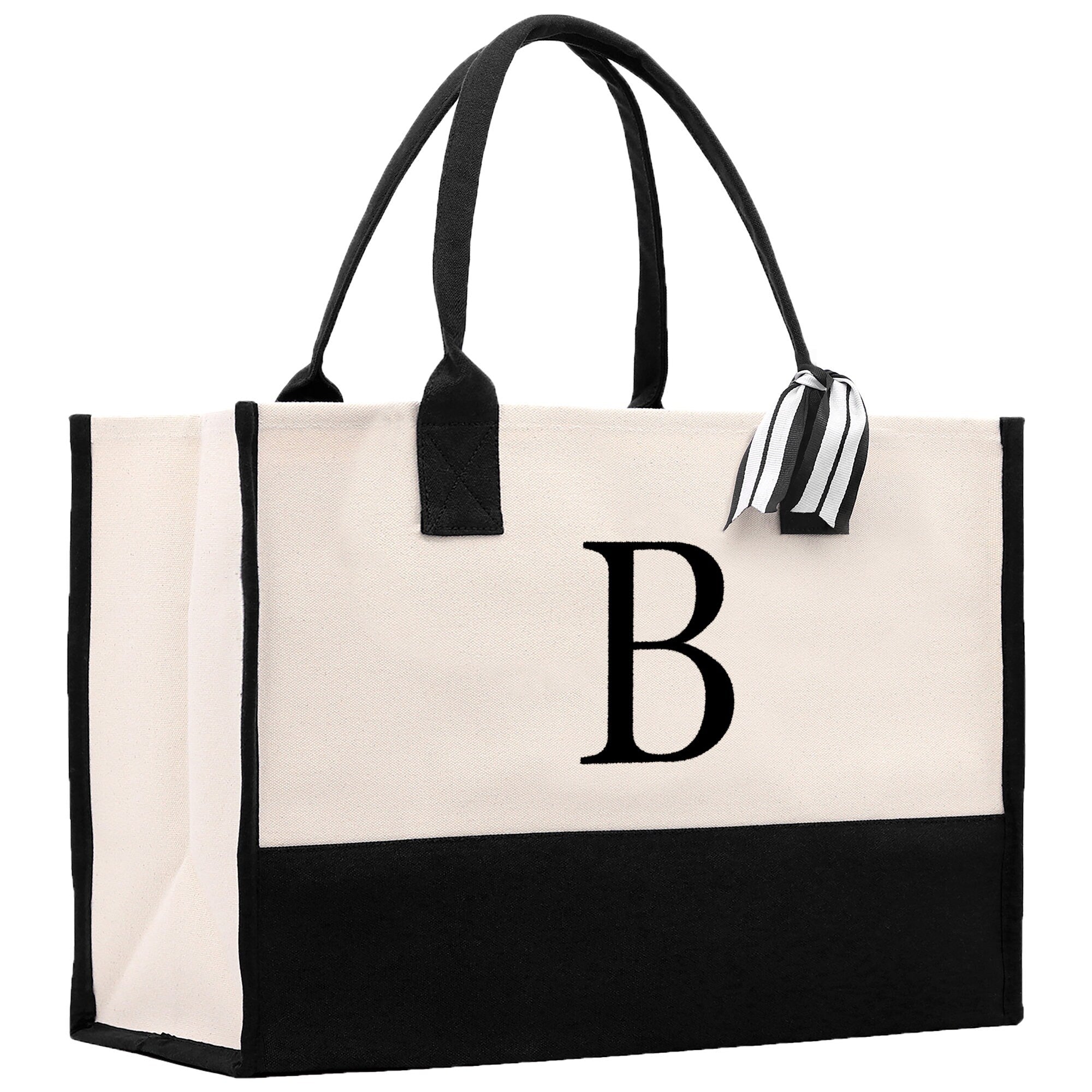 a black and white tote bag with the letter b on it