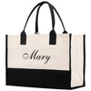 a black and white tote bag with the word mary printed on it