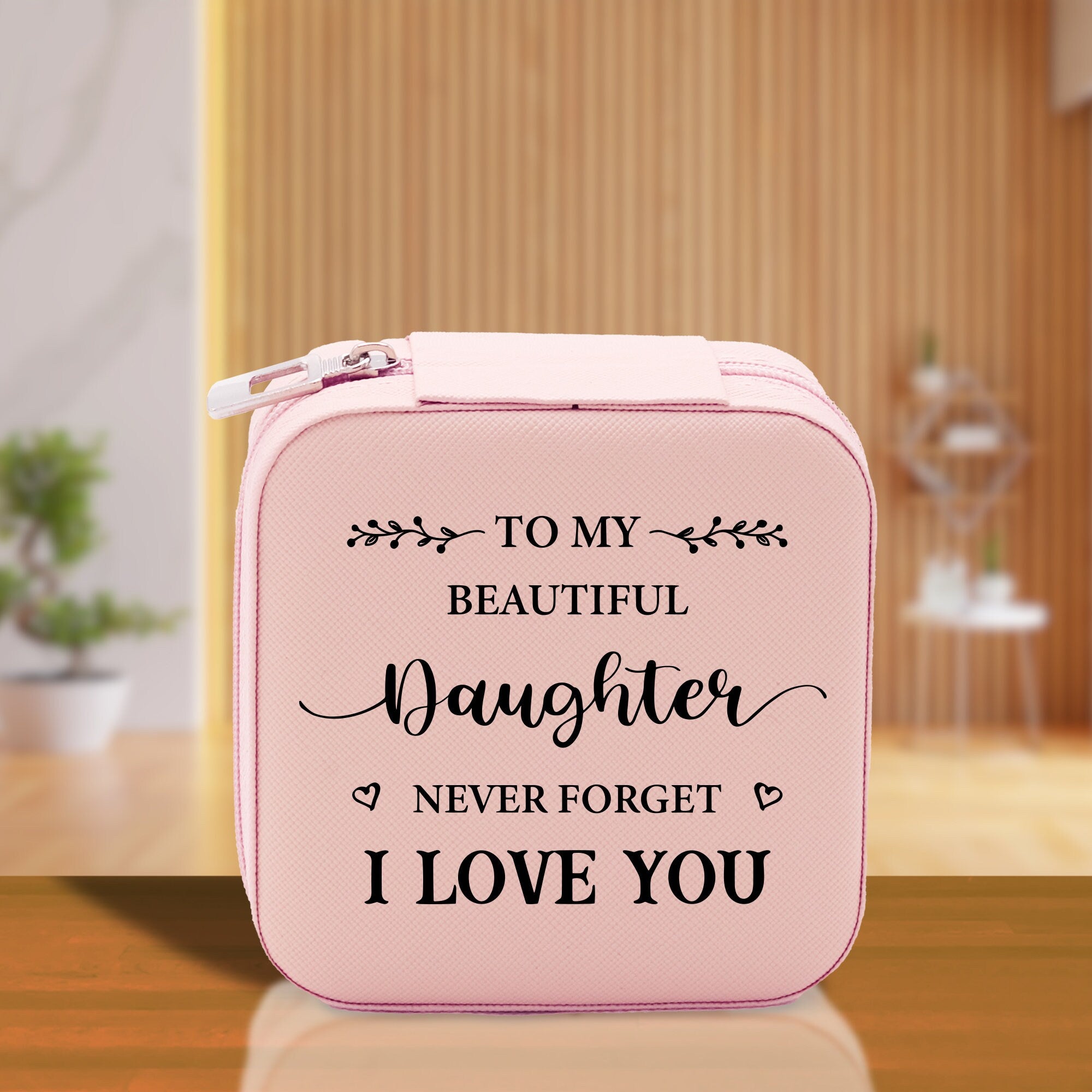 a pink lunch box with the words to my beautiful daughter never forget i love you