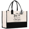 a black and white bag with a quote on it