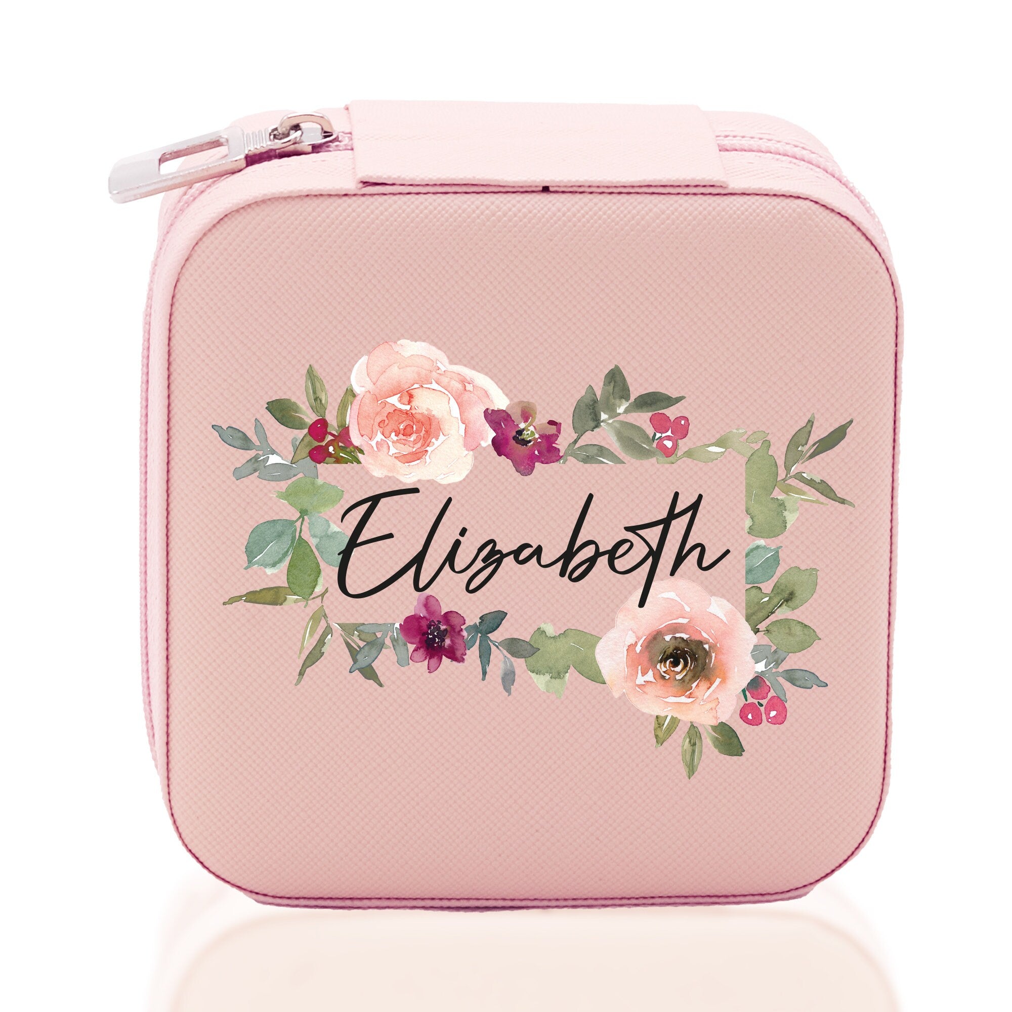 a pink suitcase with flowers and the word elizabeth on it