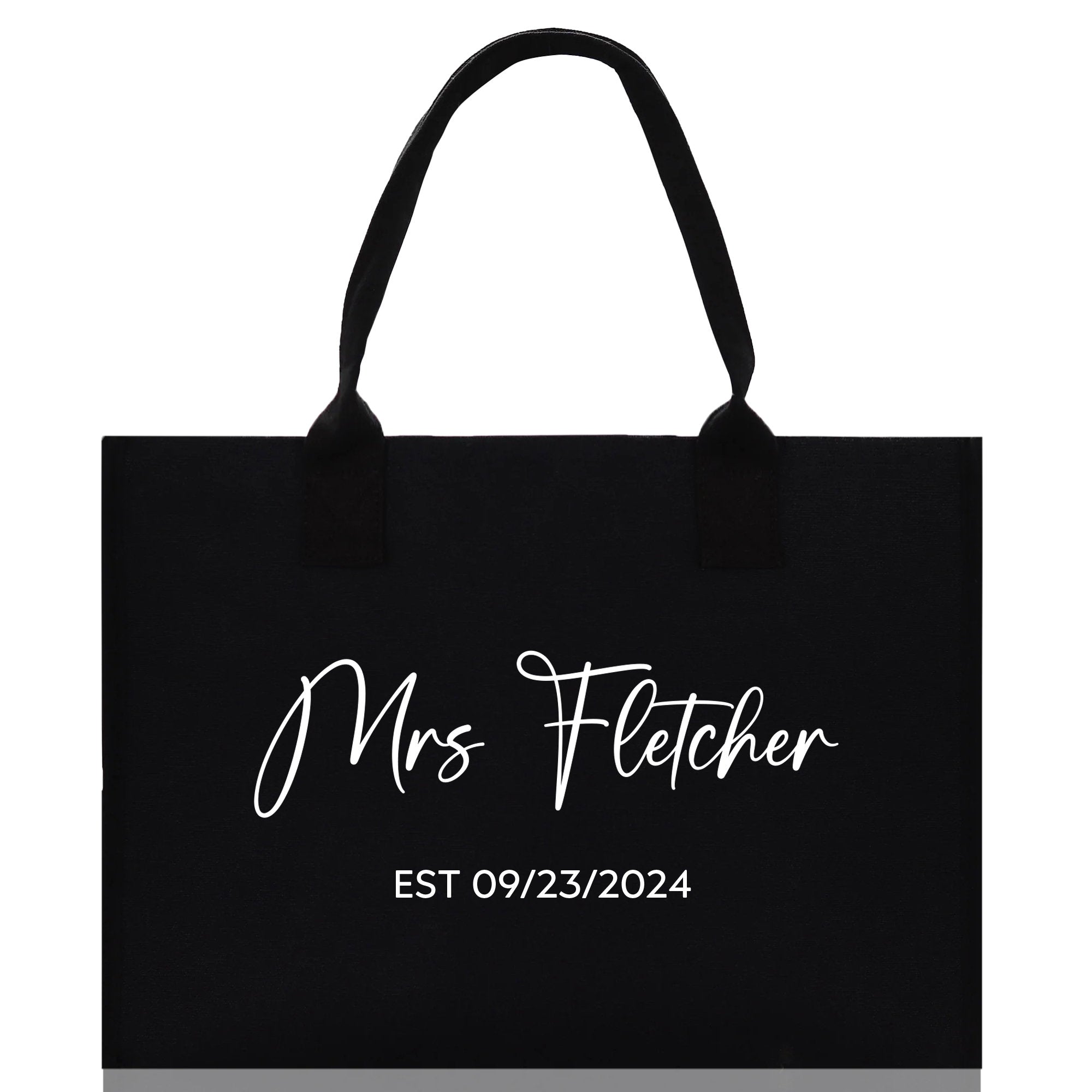 a black tote bag with the words mrs fetcher on it