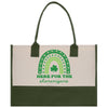 a green and white bag with a shamrock on it