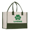 a green and white shopping bag with a shamrock on it