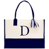 a black and white tote bag with the letter d on it