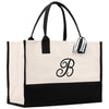 a black and white bag with a monogrammed b on it