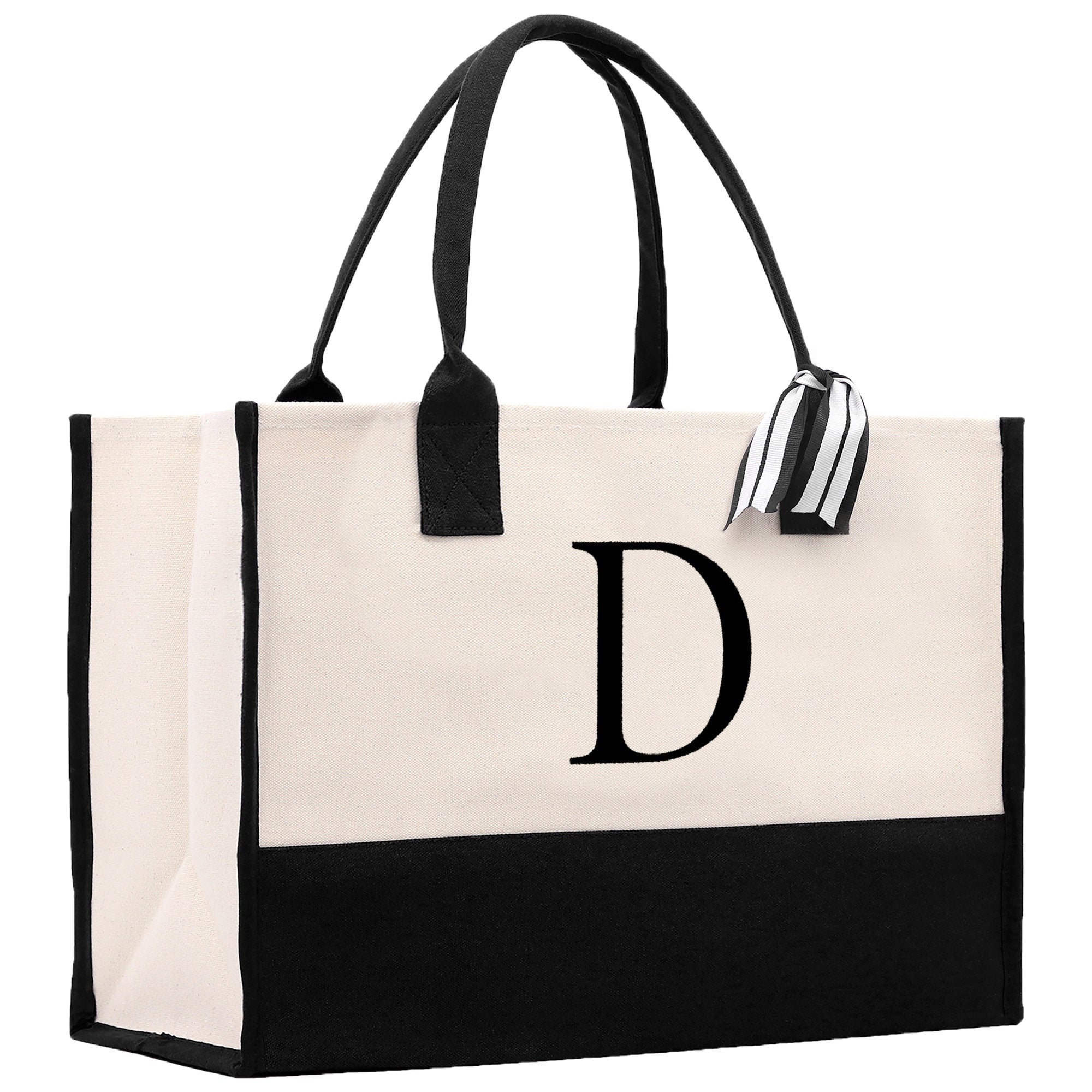 a black and white tote bag with the letter d on it