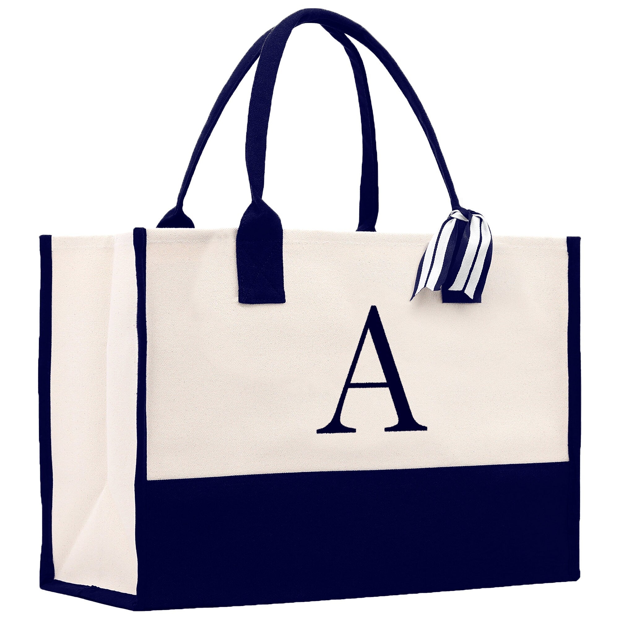 a tote bag with a monogrammed initial on it