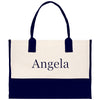 a black and white bag with the word angela on it