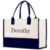 a black and white tote bag with the word dorothy on it