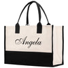 a black and white tote bag with the word angelo on it